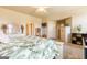Spacious bedroom featuring carpet floors, a king bed and a dresser at 313 Masters Club Blvd, Hampton, GA 30228