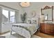 Charming bedroom featuring unique decor, stylish furnishings, and cozy natural light at 145 Kelmscott Ln, Fayetteville, GA 30214