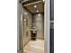 Compact elevator with light wood interior features modern controls and stylish accents at 145 Kelmscott Ln, Fayetteville, GA 30214