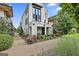Stunning two-story home boasting a brick exterior, a private balcony, and beautifully landscaped surroundings at 145 Kelmscott Ln, Fayetteville, GA 30214