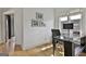 Bright home office with natural light, sleek desk, and views of the surrounding neighborhood at 145 Kelmscott Ln, Fayetteville, GA 30214