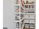 Organized walk-in pantry with ample shelving and storage for all your kitchen essentials at 145 Kelmscott Ln, Fayetteville, GA 30214