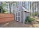 Well-maintained shed provides ample storage space in the backyard, adding convenience to the property at 204 Carmell Ct, Mcdonough, GA 30252