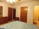 Main bedroom features an ensuite bathroom and lots of storage at 1320 Labelle St, Jonesboro, GA 30238