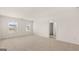 Bright, spacious bedroom with carpet flooring, two windows, neutral walls, and attached bath at 604 Whitman Ln # 27, Stockbridge, GA 30281