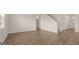 Spacious living room with beautiful wood flooring and lots of natural light at 604 Whitman Ln # 27, Stockbridge, GA 30281