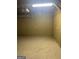 Unfinished basement with painted walls and concrete floor offering potential for customization and ample storage at 3255 Flat Shoals Sw Rd, Conyers, GA 30094