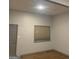 Cozy bedroom featuring neutral wall color, window view and light colored wood flooring at 3255 Flat Shoals Sw Rd, Conyers, GA 30094