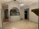 Large room with fish tank feature, arched doorway and brick design at 3255 Flat Shoals Sw Rd, Conyers, GA 30094