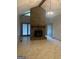 Living room with tile flooring, brick fireplace and plenty of natural light at 3255 Flat Shoals Sw Rd, Conyers, GA 30094