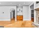 Bright living space featuring a wet bar and seamless transition to the living room at 203 Shelby Ln, Fayetteville, GA 30215