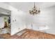 Bedroom featuring hardwood floors and a decorative chandelier at 2531 Hood Nw Ave, Atlanta, GA 30318