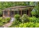 Charming brick home with covered porch and decorative ironwork at 2531 Hood Nw Ave, Atlanta, GA 30318