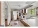 Retro kitchen with classic appliances, tile floors and bright windows at 2531 Hood Nw Ave, Atlanta, GA 30318