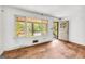 Bright living room featuring hardwood floors and a large window at 2531 Hood Nw Ave, Atlanta, GA 30318