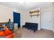 Bedroom featuring natural light, a futon, and neutral carpet at 5552 Smithfield Rd, Bowdon, GA 30108