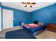 Bedroom with a comfortable bed, closet, and carpet floors at 5552 Smithfield Rd, Bowdon, GA 30108