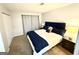 Bedroom featuring a queen-sized bed with modern bedding and a neutral color scheme at 1448 Pine Log Ne Rd # C, Conyers, GA 30012