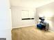 Empty room featuring neutral walls, carpet flooring, a window, and a closet at 1448 Pine Log Ne Rd # C, Conyers, GA 30012