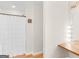 Clean bathroom showing a makeup space next to a full bathroom with a shower at 45 Plantation Ln, Locust Grove, GA 30248