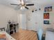 Well-lit bedroom offering wood laminate flooring, closet, and ample space at 45 Plantation Ln, Locust Grove, GA 30248