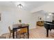Dining area featuring a table with wood floors and a view to the living area at 45 Plantation Ln, Locust Grove, GA 30248
