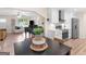 Dining area flows into a stylish, updated kitchen and connected living area at 45 Plantation Ln, Locust Grove, GA 30248