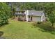 Aerial view of home with a well maintained backyard and privacy at 380 Grady Ave, Fayetteville, GA 30214
