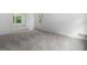 Spacious bedroom with soft carpet and natural light from the window at 380 Grady Ave, Fayetteville, GA 30214