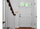 Close up shot of the entryway showing a white front door with glass panes at 380 Grady Ave, Fayetteville, GA 30214