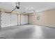 Spacious two-car garage with bright lighting and a window, perfect for parking and storage at 380 Grady Ave, Fayetteville, GA 30214