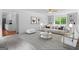 Bright living room with modern decor, built-in shelving, and comfortable seating for relaxing and entertaining at 380 Grady Ave, Fayetteville, GA 30214