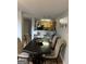 Cozy dining room with access to the kitchen and stylish seating for six at 45 Fieldview Ln, Covington, GA 30016