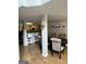 Open-concept dining and kitchen area with wood floors and ample space for entertaining at 45 Fieldview Ln, Covington, GA 30016
