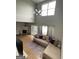 Inviting living room with a fireplace, large windows, and comfortable seating at 45 Fieldview Ln, Covington, GA 30016