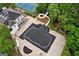 Aerial view of the community pool area, showcasing the pool slide and surrounding amenities at 495 Stonehaven Dr, Fayetteville, GA 30215