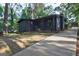 View of modern home with freshly cut grass and a concrete driveway at 1147 Tanglewood Rd, Jonesboro, GA 30236