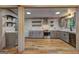 Kitchen featuring stainless steel appliances, bright countertops and hardwood floors at 1147 Tanglewood Rd, Jonesboro, GA 30236