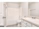 Clean, bright bathroom featuring a tub-shower combo, single sink vanity, and tile flooring at 1716 Anniston Dr, Mcdonough, GA 30253