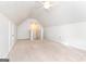 Spacious bedroom with neutral carpet, ceiling fan, and bright, fresh paint at 1716 Anniston Dr, Mcdonough, GA 30253