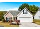 Charming single-Gathering home boasts a well-manicured lawn and a two-car garage, perfect for modern living at 1716 Anniston Dr, Mcdonough, GA 30253