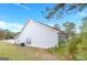 Well-maintained home exterior featuring vinyl siding and a lush, green lawn at 1716 Anniston Dr, Mcdonough, GA 30253