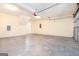 Spacious two car garage featuring painted walls, a concrete floor, and interior access at 1716 Anniston Dr, Mcdonough, GA 30253