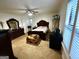 Cozy main bedroom with traditional furnishings and neutral carpeting at 104 Hillmont Dr, Woodstock, GA 30188
