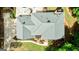 Aerial view of a roof, a landscaped path, and a well-maintained green lawn at 255 Emerald Lake Dr, Fayetteville, GA 30215