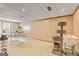 Finished basement area with carpeted flooring, wood paneling, and abundant space for activities at 255 Emerald Lake Dr, Fayetteville, GA 30215