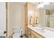 Bathroom featuring vanity with storage and glass enclosed shower at 255 Emerald Lake Dr, Fayetteville, GA 30215