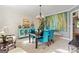 Elegant dining room with stylish chandelier and statement art piece at 255 Emerald Lake Dr, Fayetteville, GA 30215