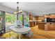 Well-designed kitchen with hardwood floors, wooden cabinets, and a bright office space nearby at 255 Emerald Lake Dr, Fayetteville, GA 30215