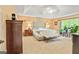 Comfortable main bedroom with ceiling fan and a window at 255 Emerald Lake Dr, Fayetteville, GA 30215